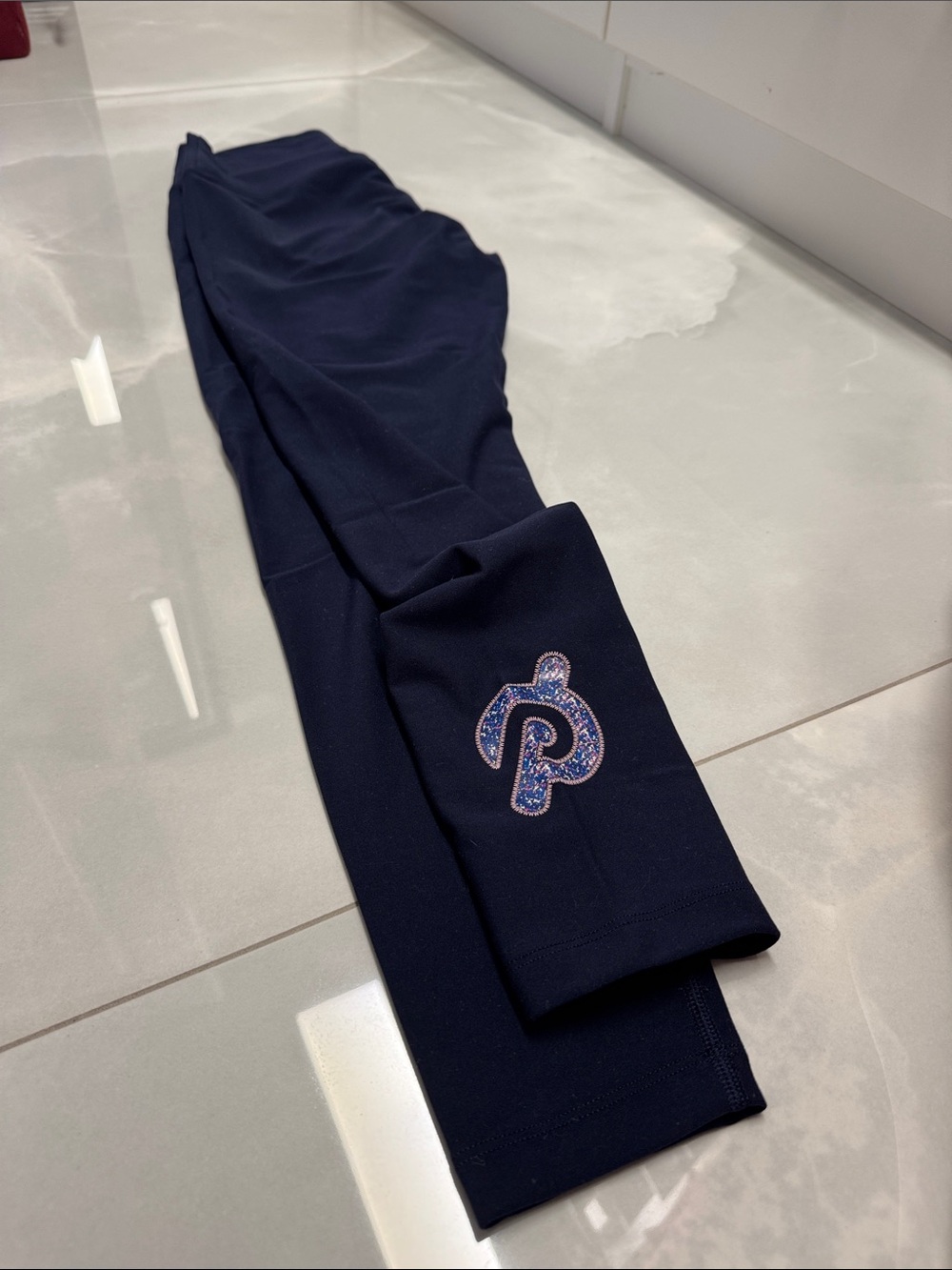 Peloton Navy Leggings with Speck Graphic 'P' Logo